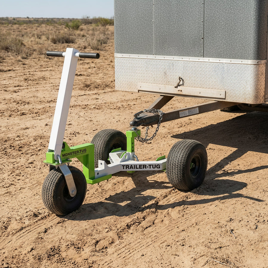 Monster-Tug trailer dolly hooked to an enclosed trailer on desert ground