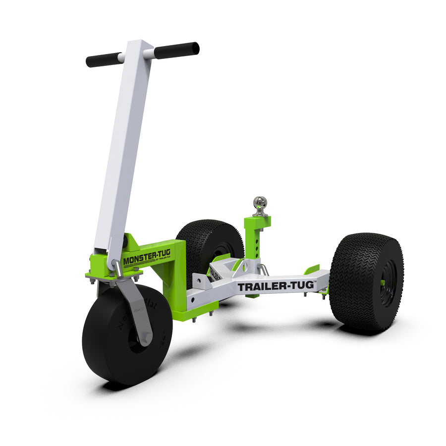 Green and white Monster Tug model in front of a white background